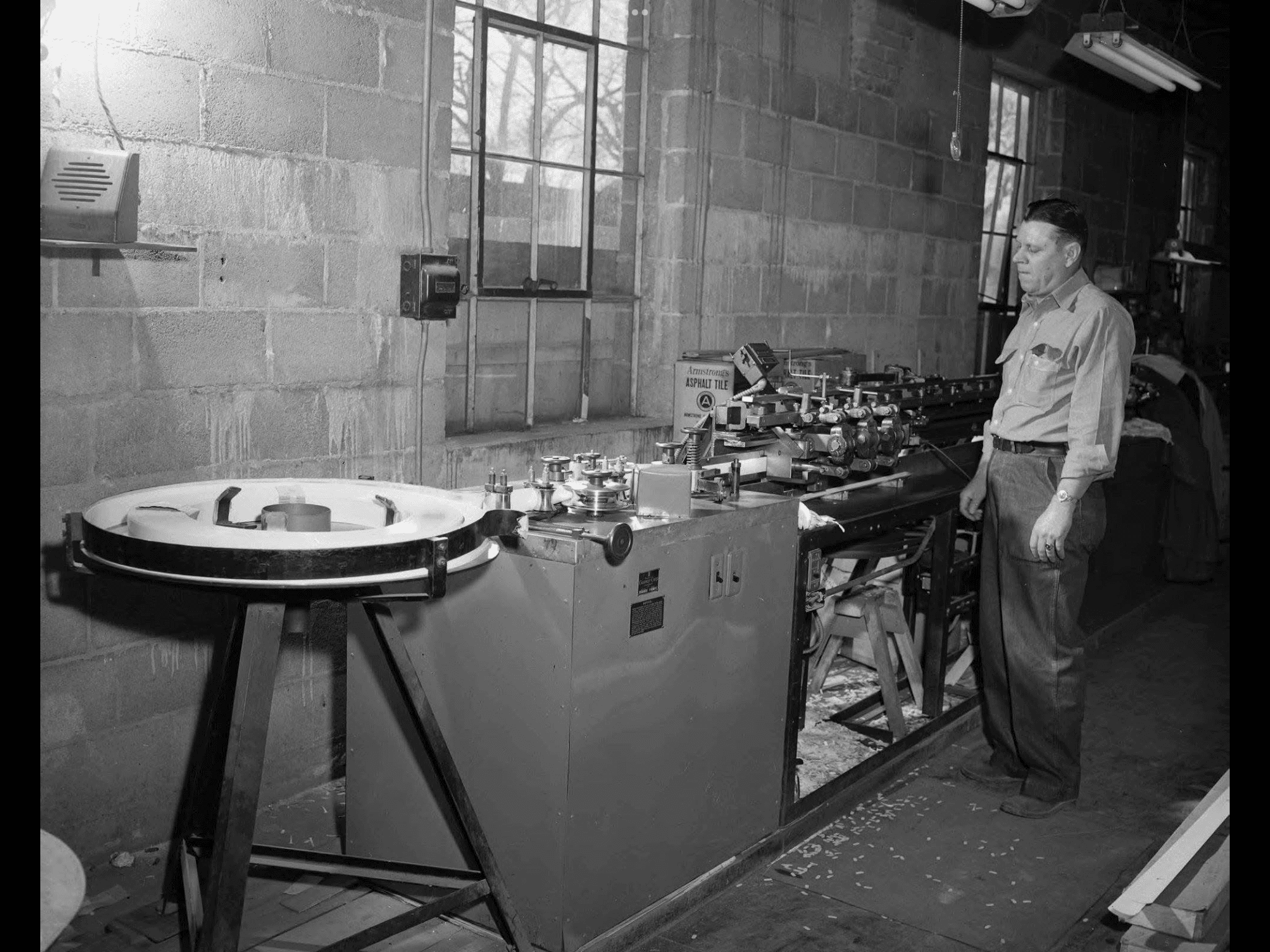 Worker at a machine